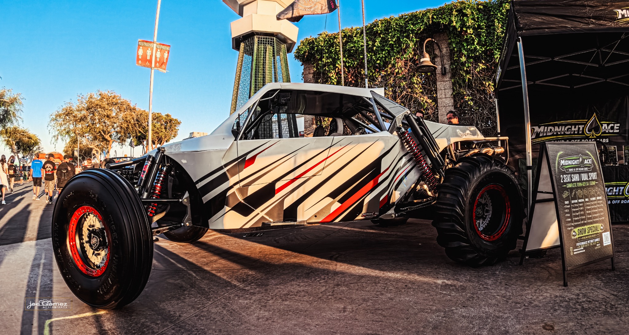 Side profile of the Midnight Ace sand rail, showing its cabin, wheels and exposed suspension