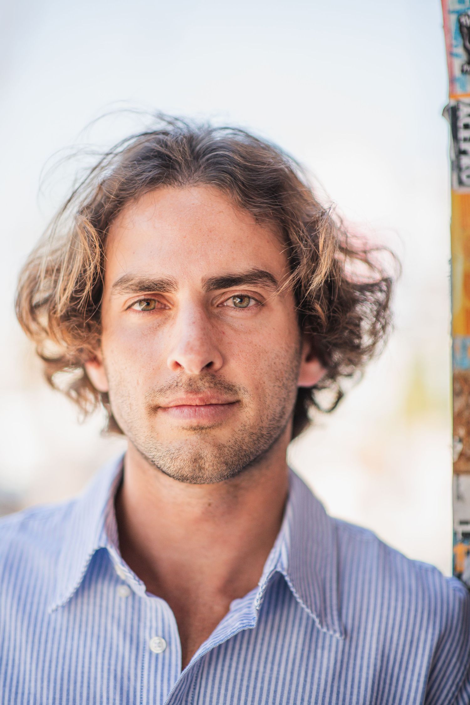 Close professional editorial headshot with soft natural light and direct eye contact, photographed by Joe Gomez.